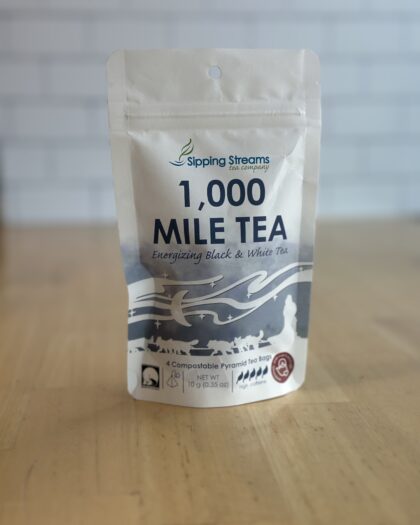 Small pouch of Yukon Quest 1000 Mile Tea with 4 compostable pyramid sachets inside. A bold black tea blend honoring the spirit of Alaska’s Yukon Quest race.