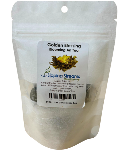 A Golden Blessing Blooming Art Tea 3-pack, featuring hand-tied green tea leaves with marigold blossoms designed to bloom beautifully when steeped.