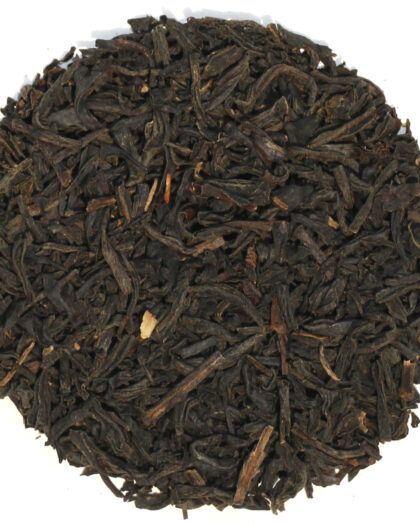 A wholesale 1 lb bag of Organic Grand Keemun loose leaf black tea, featuring twisted tea leaves known for their refined flavor and mellow character.