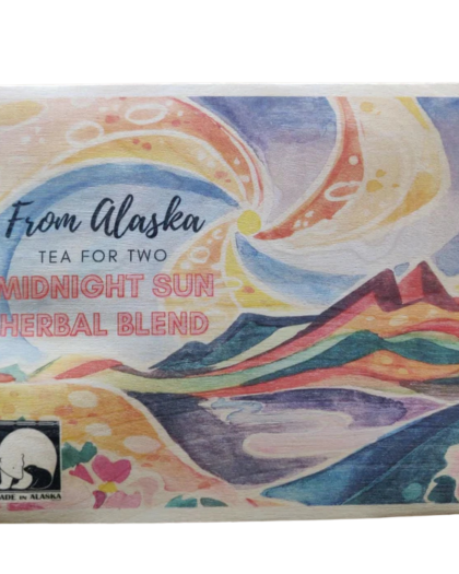 A colorful wooden postcard labeled "Midnight Sun Herbal Blend – Tea for Two", featuring an abstract Alaskan mountain scene beneath a swirling sky. Contains two servings of herbal tea from Sipping Streams Tea Company.