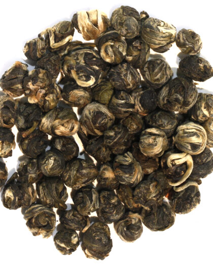 A wholesale 1 lb bag of Jasmine Pearls green tea, featuring tightly rolled pearls that gently unfurl during steeping and release a delicate jasmine aroma.