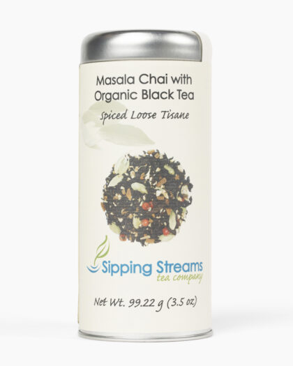A 3.5 oz tall tin of Masala Chai loose leaf tea by Sipping Streams Tea Company, labeled “Masala Chai with Organic Black Tea – Spiced Loose Tisane,” featuring an image of the spiced tea blend.
