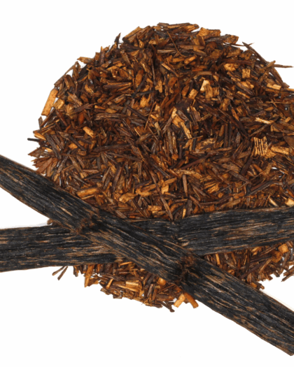 A circular pile of reddish-brown rooibos loose leaf tea sits centered on a white background, accented by two full vanilla bean pods laid in a criss-cross on top. The image highlights the earthy tones and natural ingredients of Sipping Streams Tea Company's Organic Vanilla Rooibos.