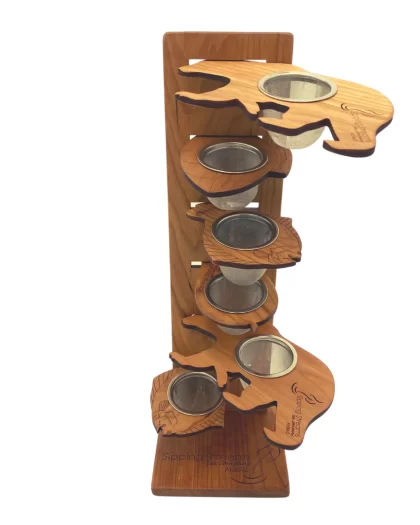 Natural wooden stand for holding tea infusers or strainers. Compact, durable, and designed to keep tea tools clean and dry between uses.