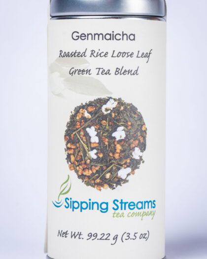 A tall retail tin filled with Genmaicha loose leaf green tea, featuring toasted brown rice blended with green tea for a savory, comforting flavor.