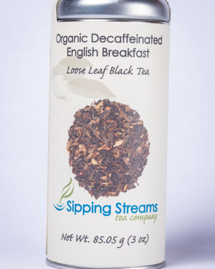 A tall retail tin filled with Organic Decaffeinated English Breakfast tea, offering a rich, balanced black tea flavor with reduced caffeine.