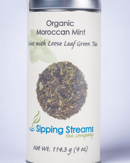 A tall retail tin filled with Organic Moroccan Mint with Green Tea, featuring organic green tea blended with aromatic mint for a crisp, refreshing infusion.
