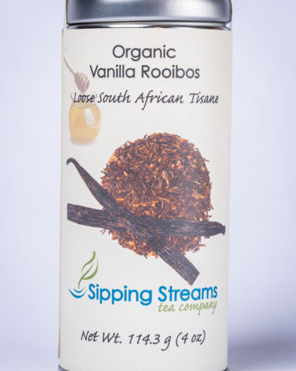A tall retail tin filled with Organic Vanilla Rooibos, featuring naturally sweet rooibos blended with comforting vanilla notes.