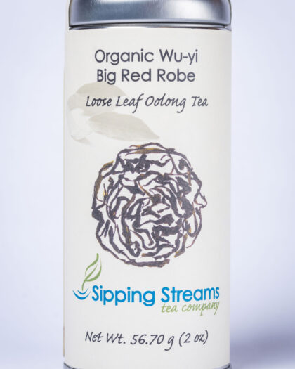 A tall retail tin filled with Wu-Yi Big Red Robe oolong tea, featuring dark, twisted leaves known for their roasted aroma and mineral-rich flavor.